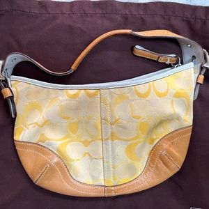 Small yellow, authentic coach handbag